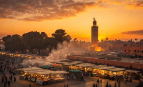 Traditional Marrakech food stalls at Djemaa el-Fna square during sunset with tagines and Moroccan cuisine