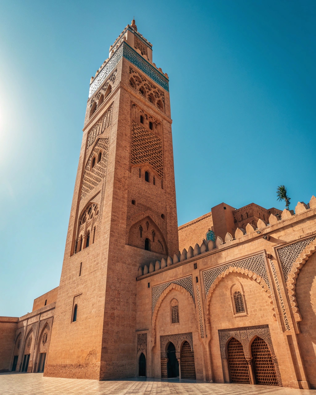 Koutoubia Mosque minaret in Marrakech city center, the iconic 77-meter tower that serves as a landmark on the Marrakech Morocco map