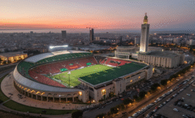 Aerial view of AFCON 2025 stadiums in Morocco showcasing Stade Mohammed V in Casablanca with vibrant crowds and city skyline, highlighting the excitement of Africa's premier football tournament venues and Moroccan hospitality