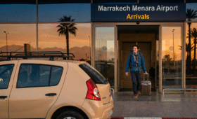 Hassle-free Marrakech Menara airport transfer: Traveler arriving at modern airport with options like taxis and private rides ready for quick city center journey, 5-6 km from vibrant Medina, essential guide for seamless Morocco vacation start