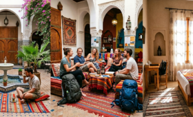 Cheap accommodation in Morocco including traditional riad courtyard, rooftop terrace in Marrakech medina, and budget-friendly traveler stay