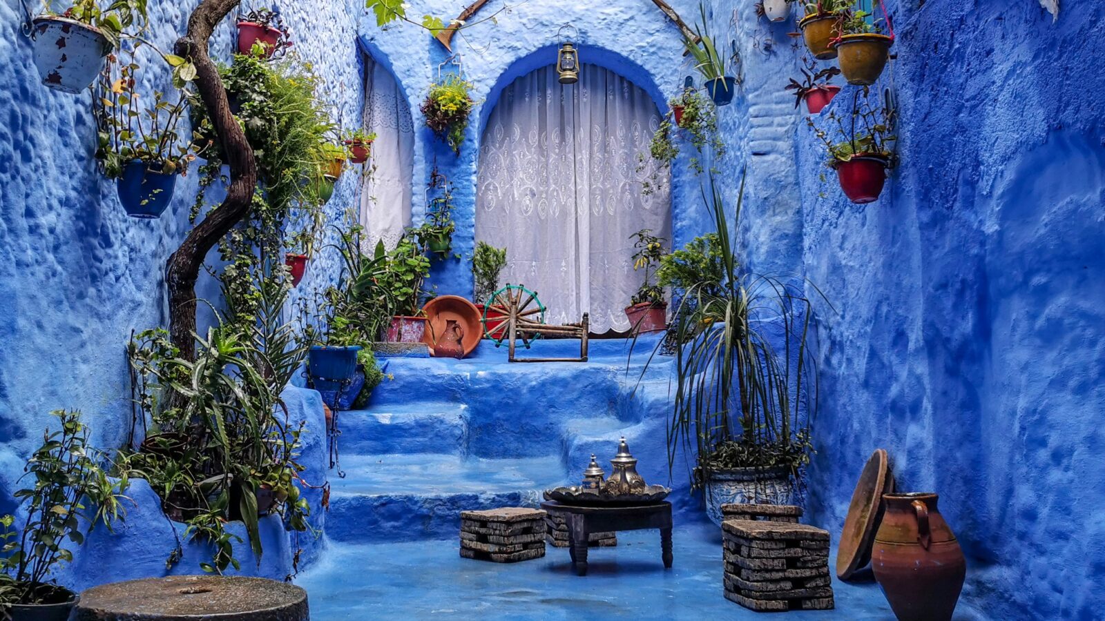 A blue-painted room with a blue floor, blue walls, and blue furniture, Chefchaouen